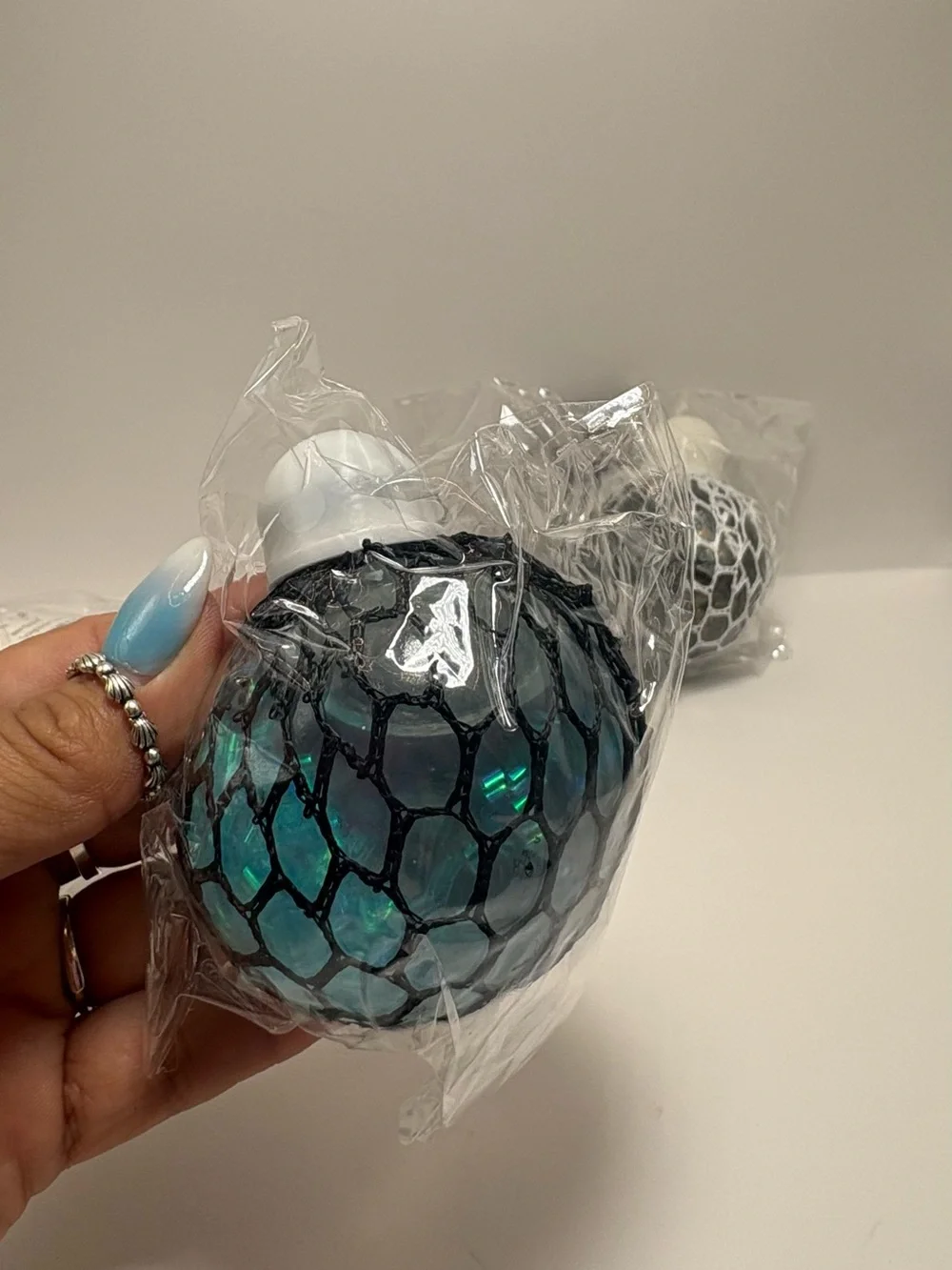 Set of 3 Mesh Stress Balls - White, Teal, Black squishy toys
